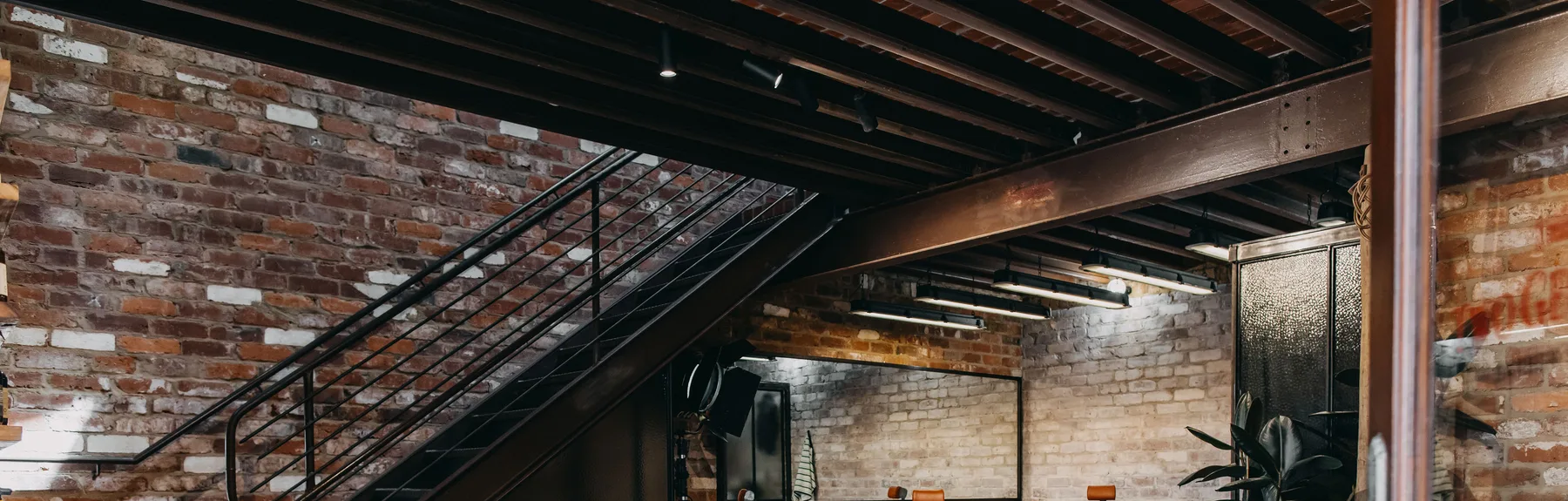 The original 1890s beams and the stair over the floor at The Two Georges, Fremantle